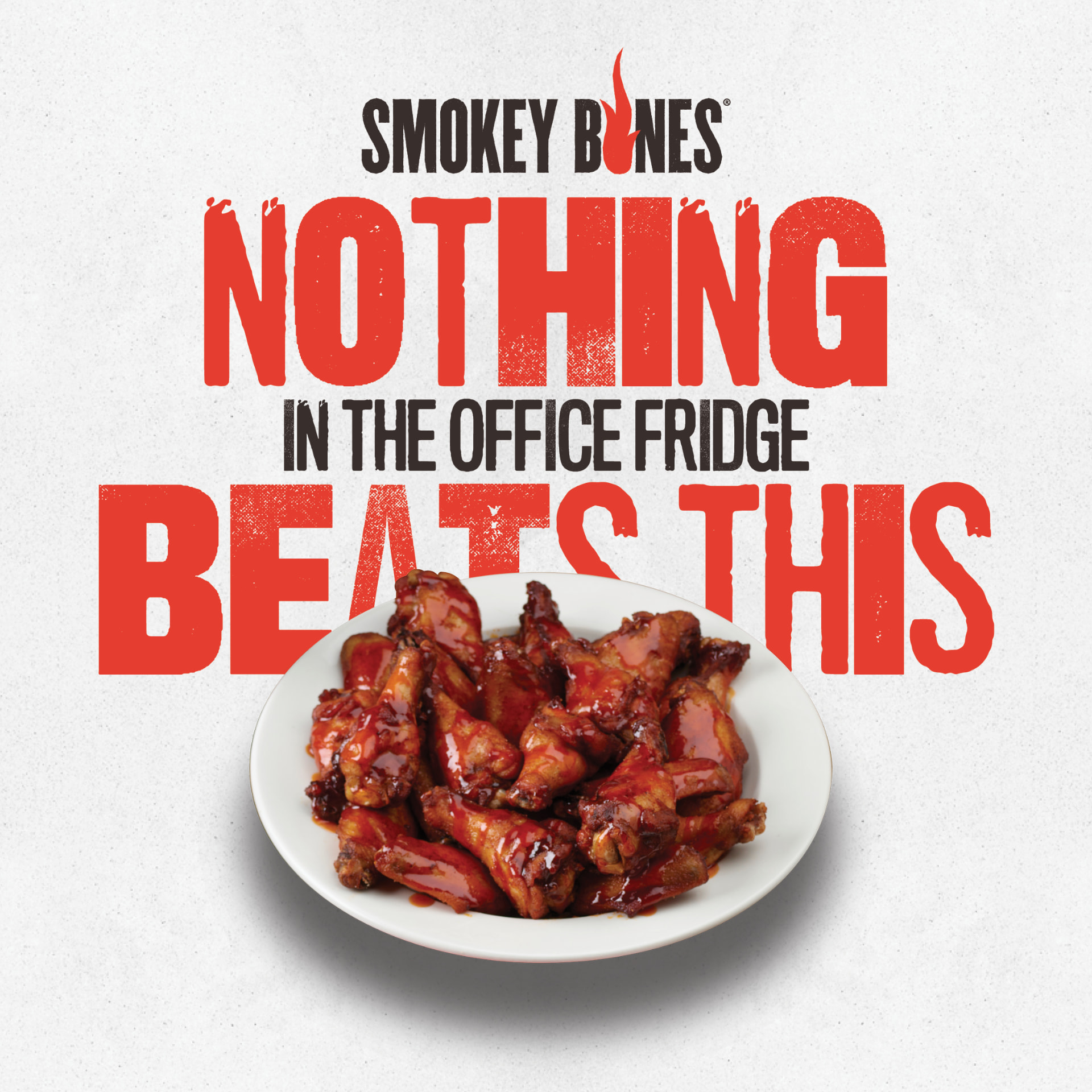 Smokey Bones social media post with glazed wings and bold typography